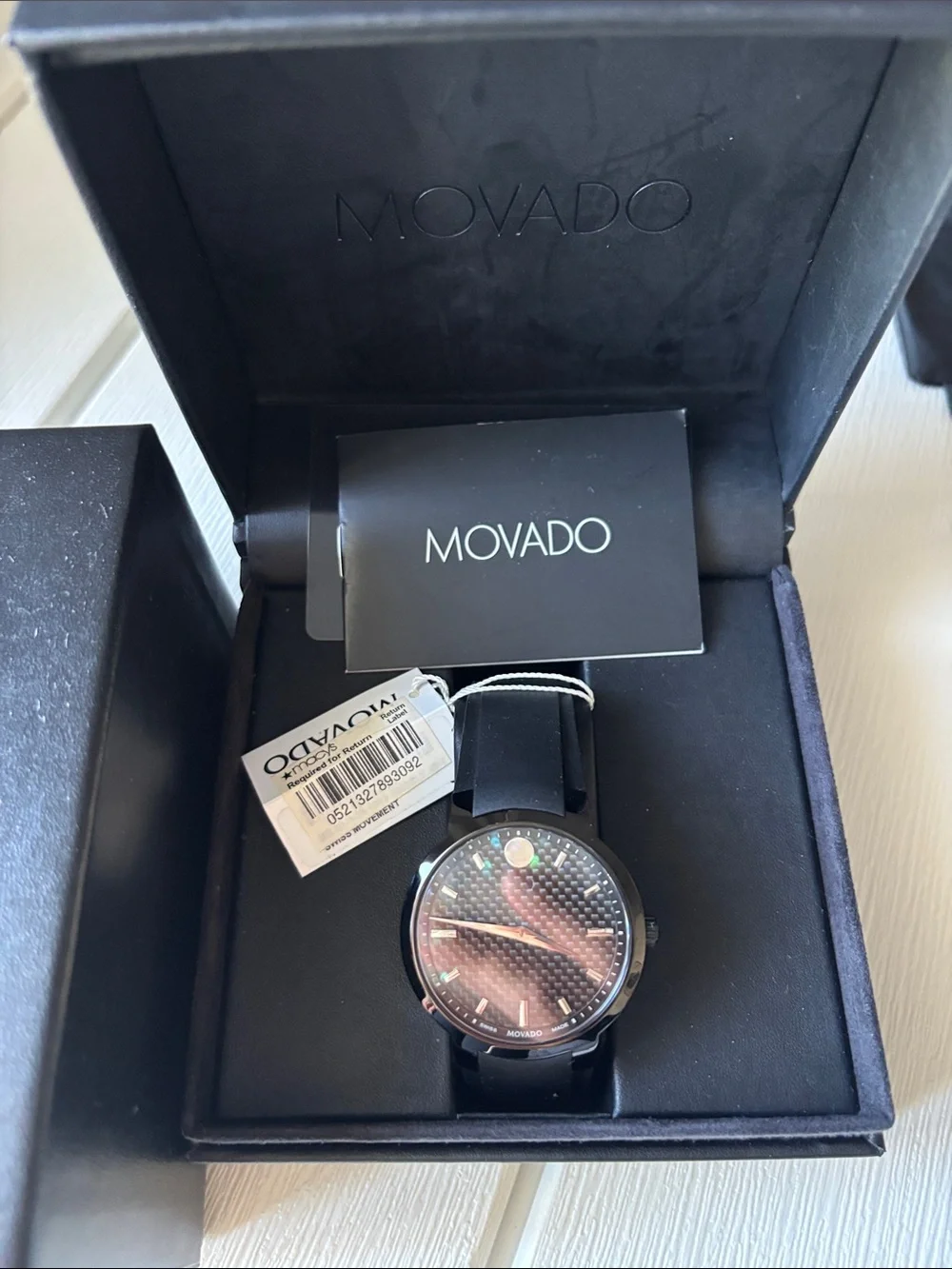 Movado Men's Black Textured Dial Watch with Black Leather Strap needs battery